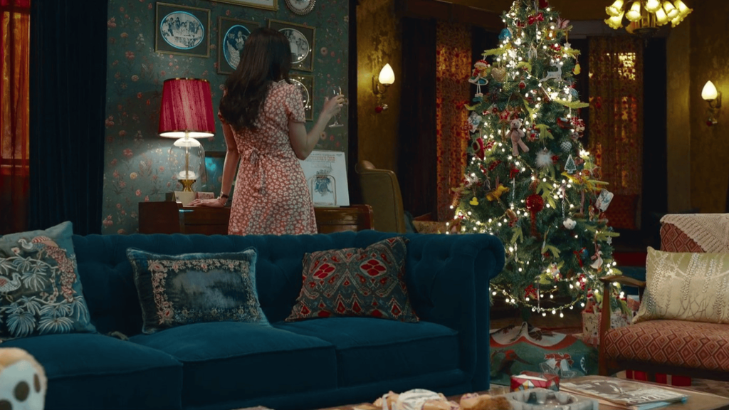 Vintage-style cushions adding charm to Maria’s apartment décor