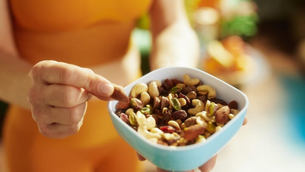 Healthy fats for a balanced diet including olive oil, avocado and nuts